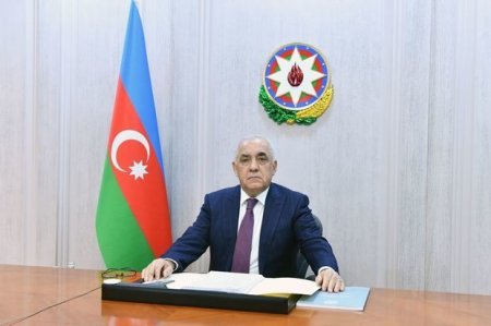 Али Асадов провел телефонный разговор с Джевдетом Йылмазом